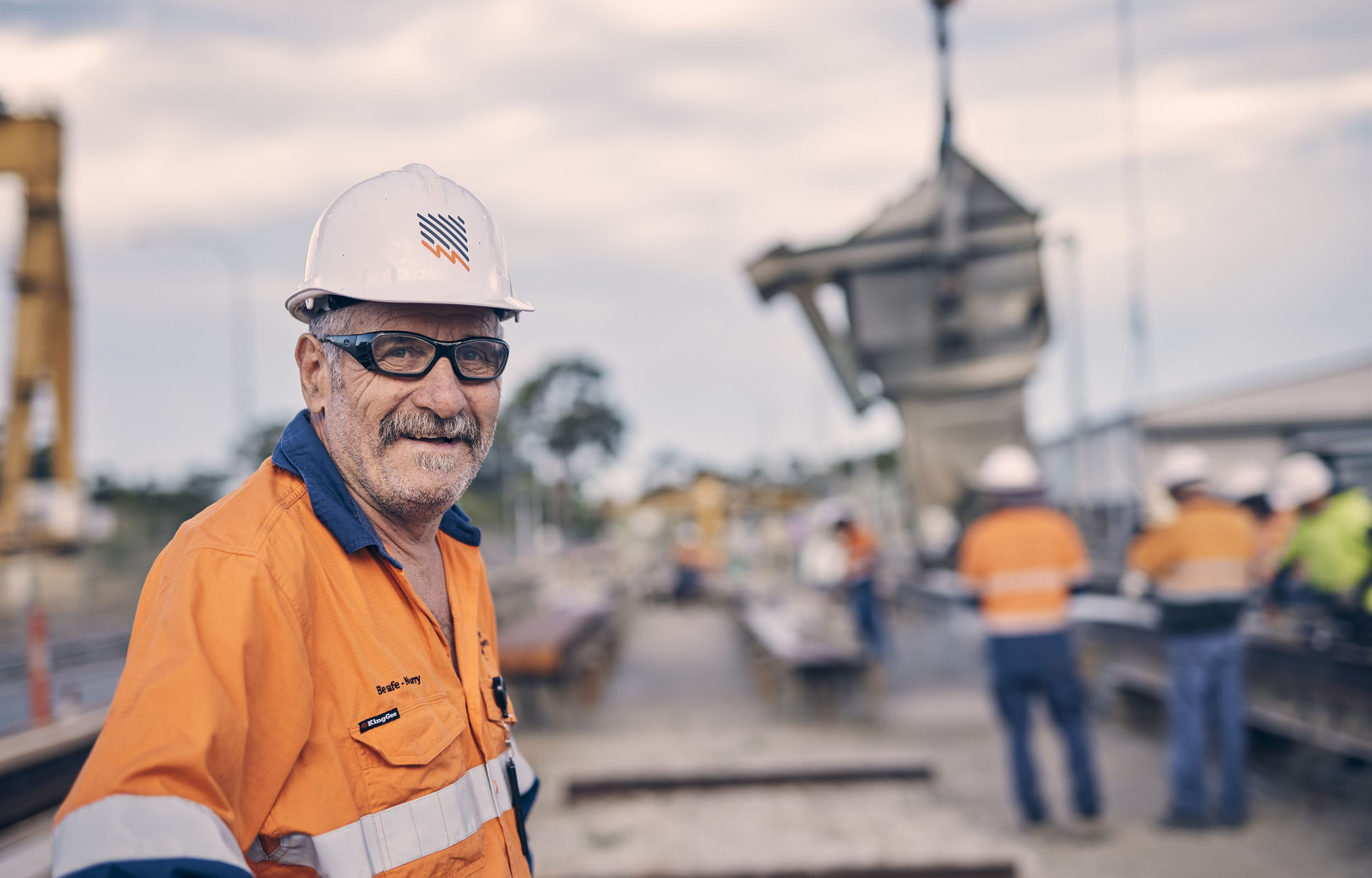 Pole manufacturing coordinator Brian Docking looks on during construction activities at the Stobie pole construction facility in Angle Park.